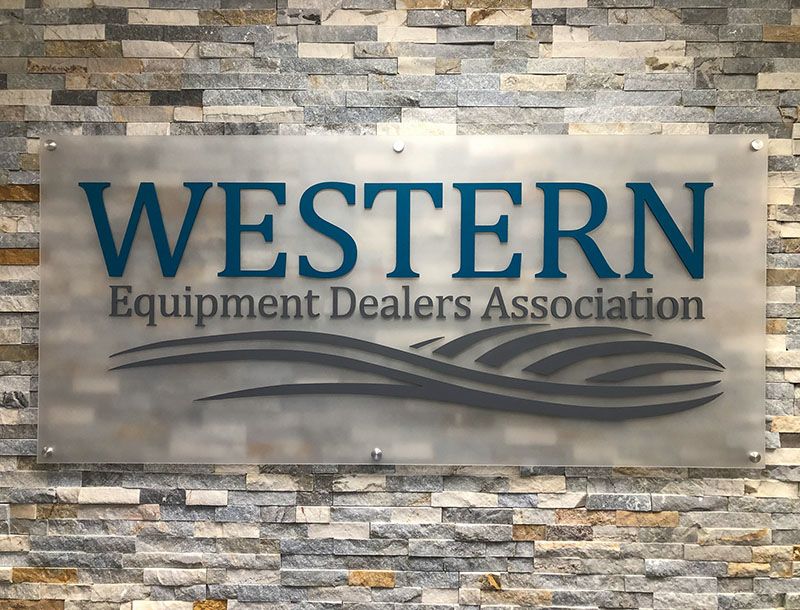 front view western equipment dealer sign blog photo
